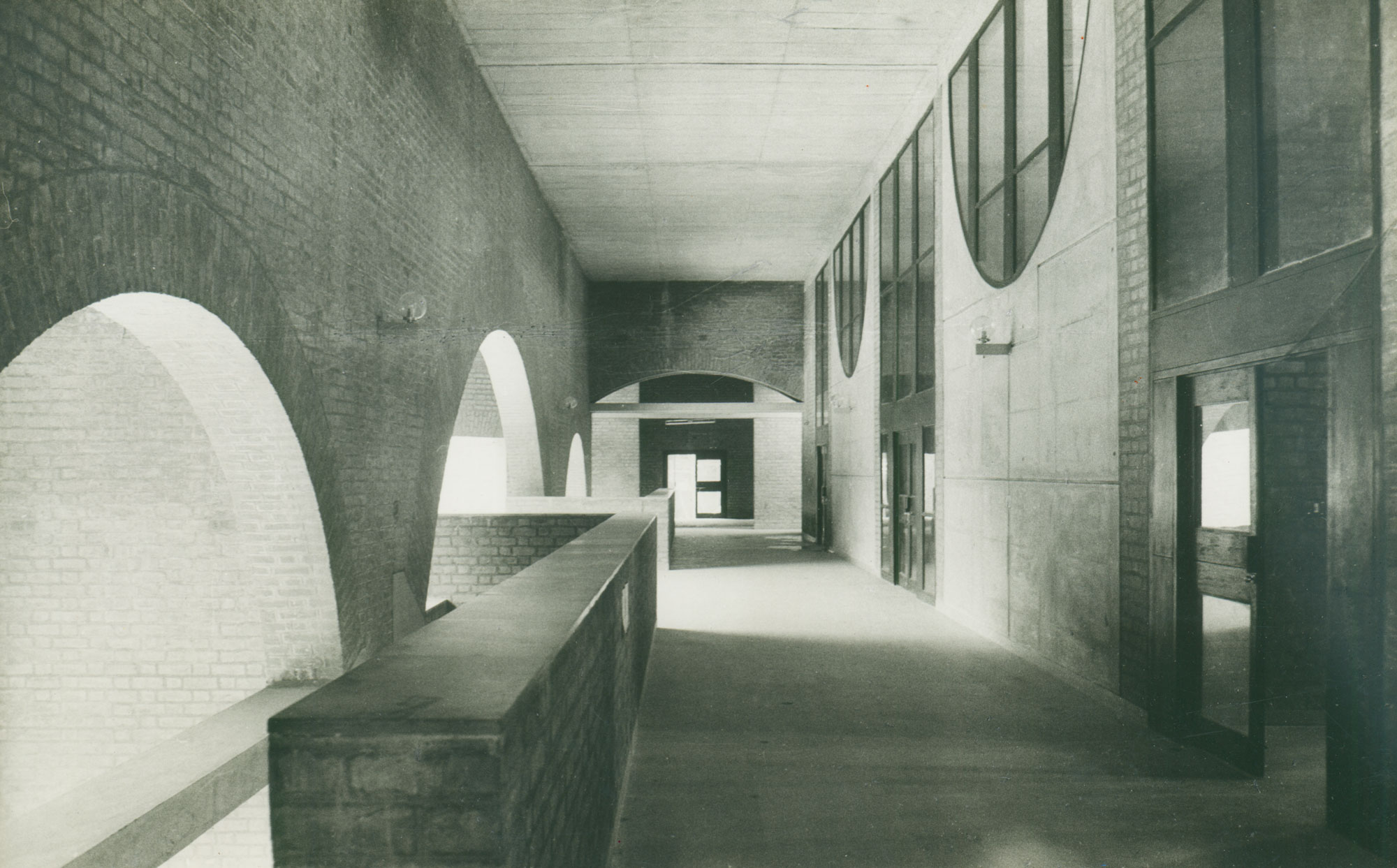 Balck and white photograph of hallway in academic building
