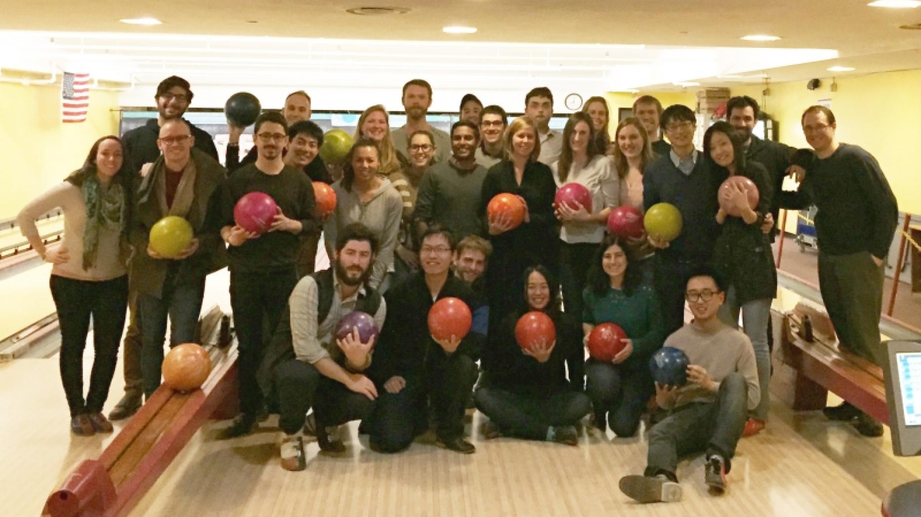 Group photo of students at a bowling alley