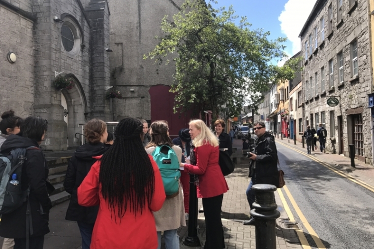 Group gathers on street in Galway