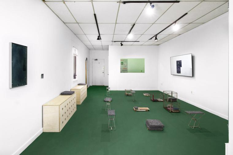 Room installation with green floor