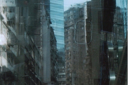 Panorama volume 28 spring 2020. Background is city buildings reflected in a window