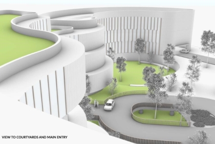 Students' design project for a new cancer treatment center with green space just outside the entrance as well as on the rooftop.