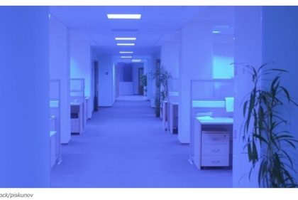 An office space with purple UV light