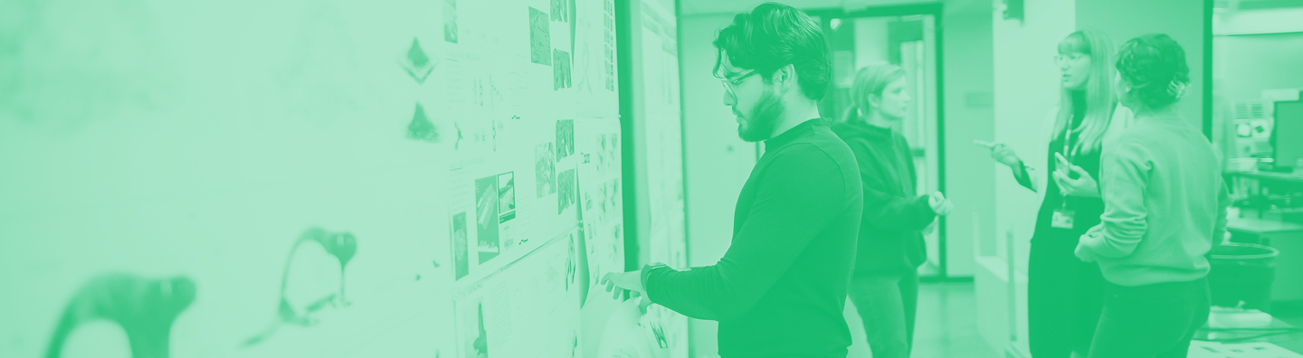 man working on whiteboard