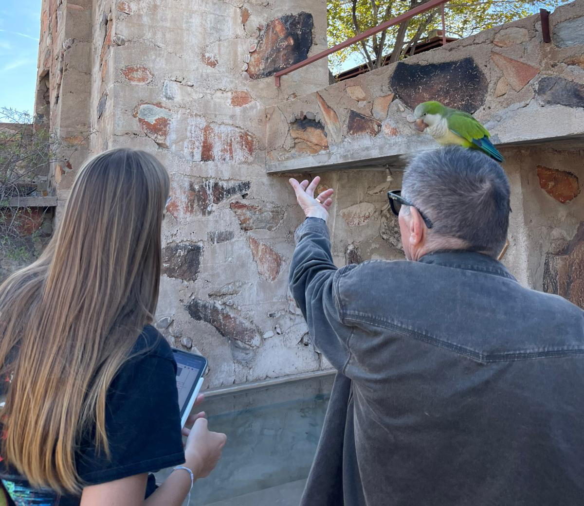 Two people viewing the structure