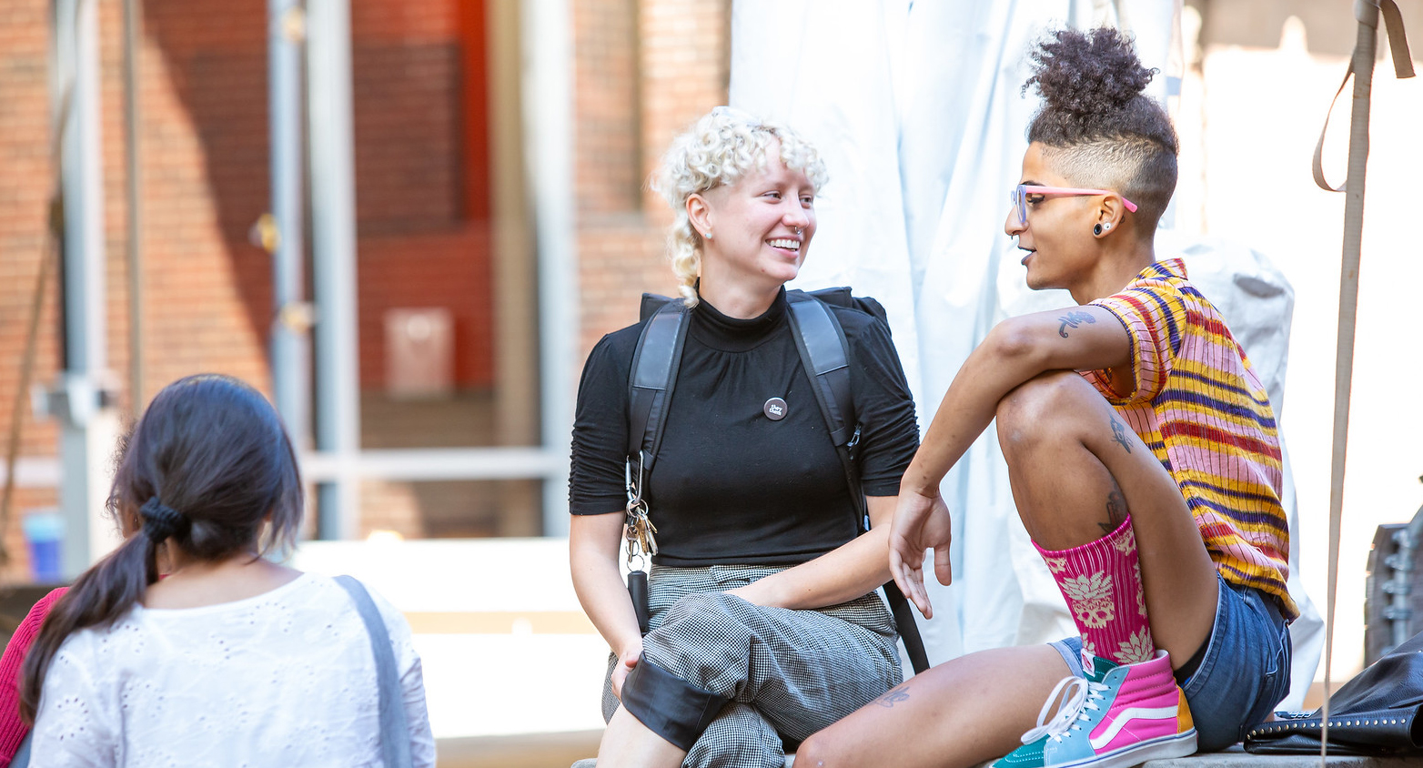 Students sitting outside Meyerson Hall