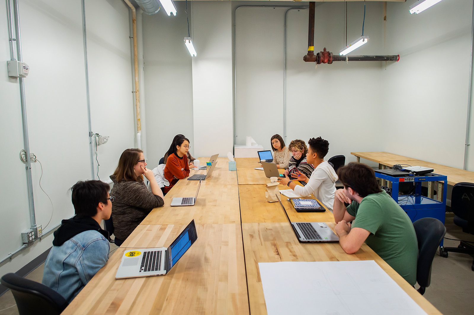 Students gathered around a table.