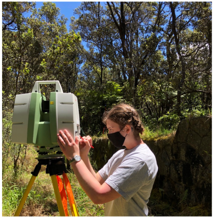 Tali Flatte operating a total station at Hawai'i Volcanoes National Park.