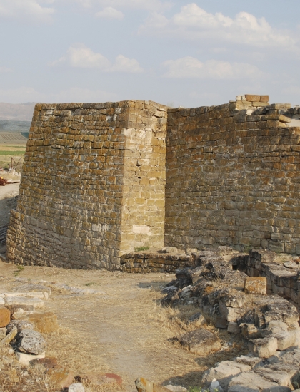 Stone wall from an ancient structure at the archaeological site.