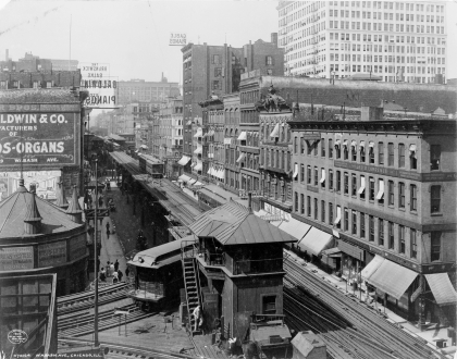 black and white photo of elevated train tracks