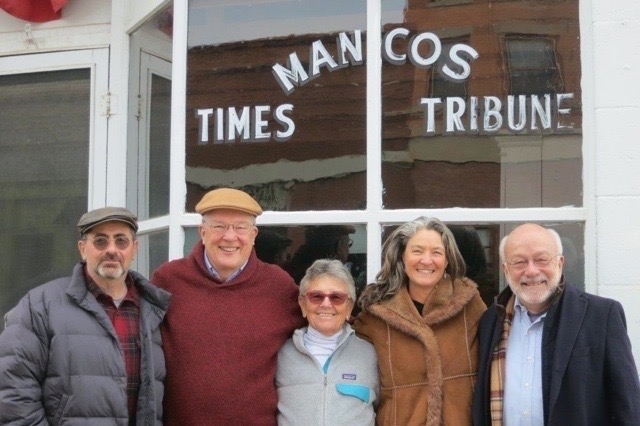 Group shout outside Mancos building.