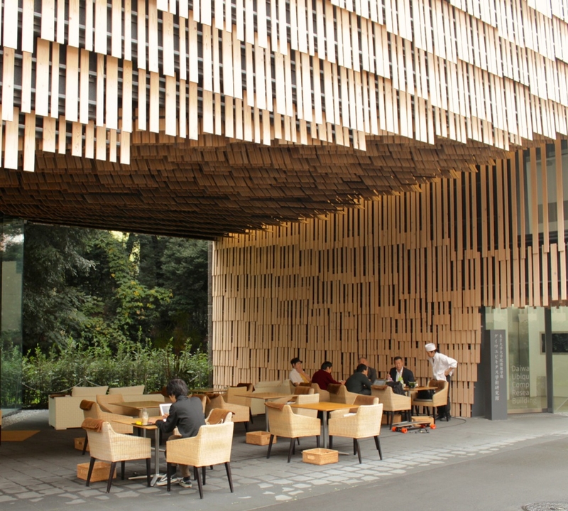 Seating area under stylish wood plank archway