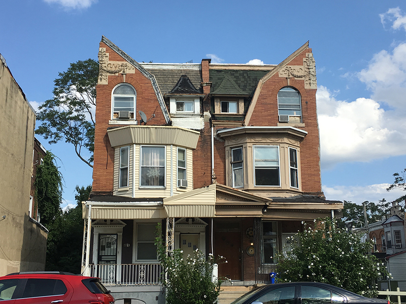 Philadelphia twin rowhouses that have had neighboring houses demolished 