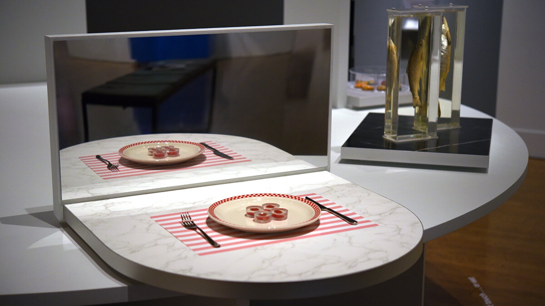 dinner set with mirror in front of it