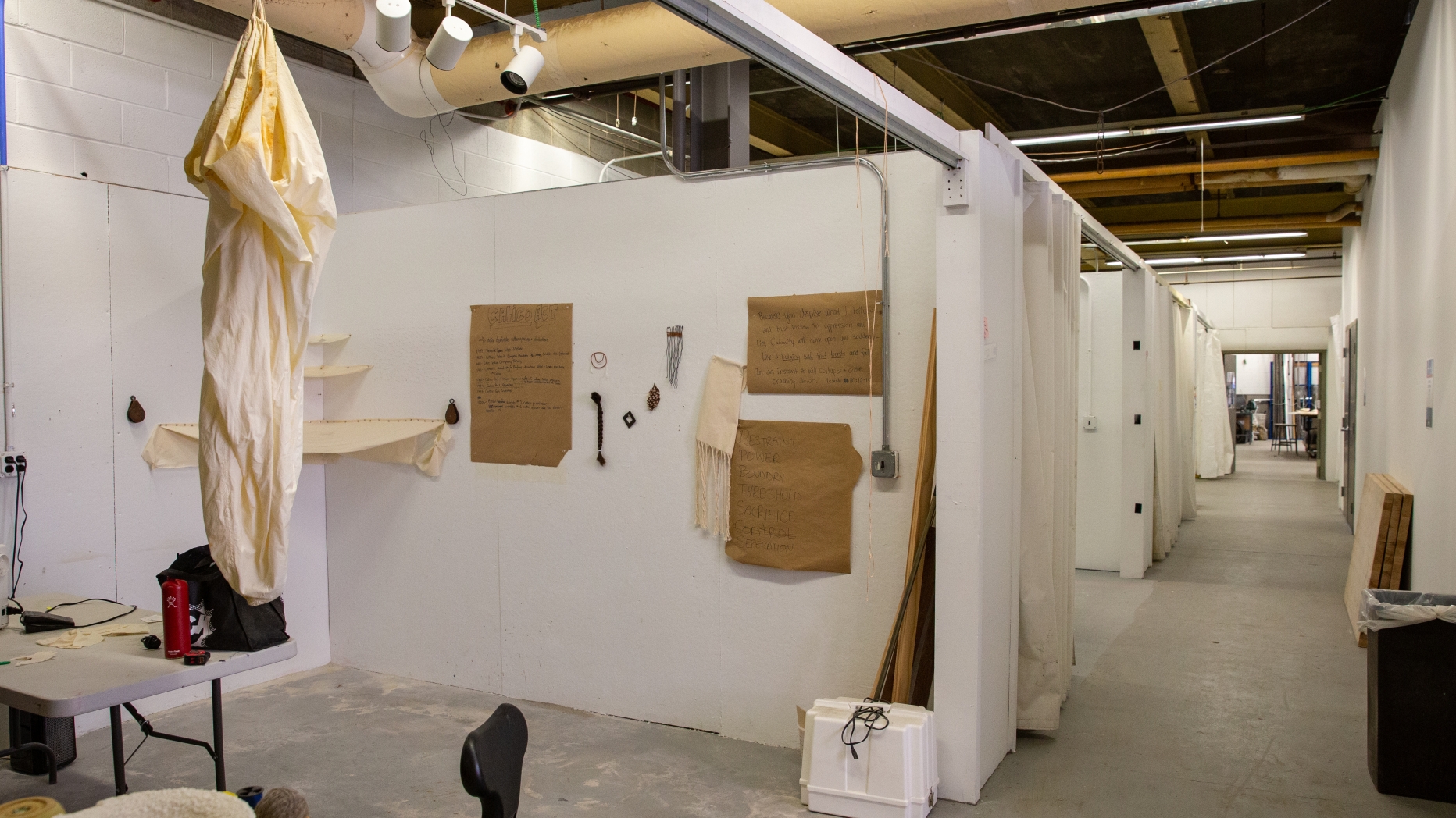 image of an open studio in franklin, looking down the hall to see all other studios