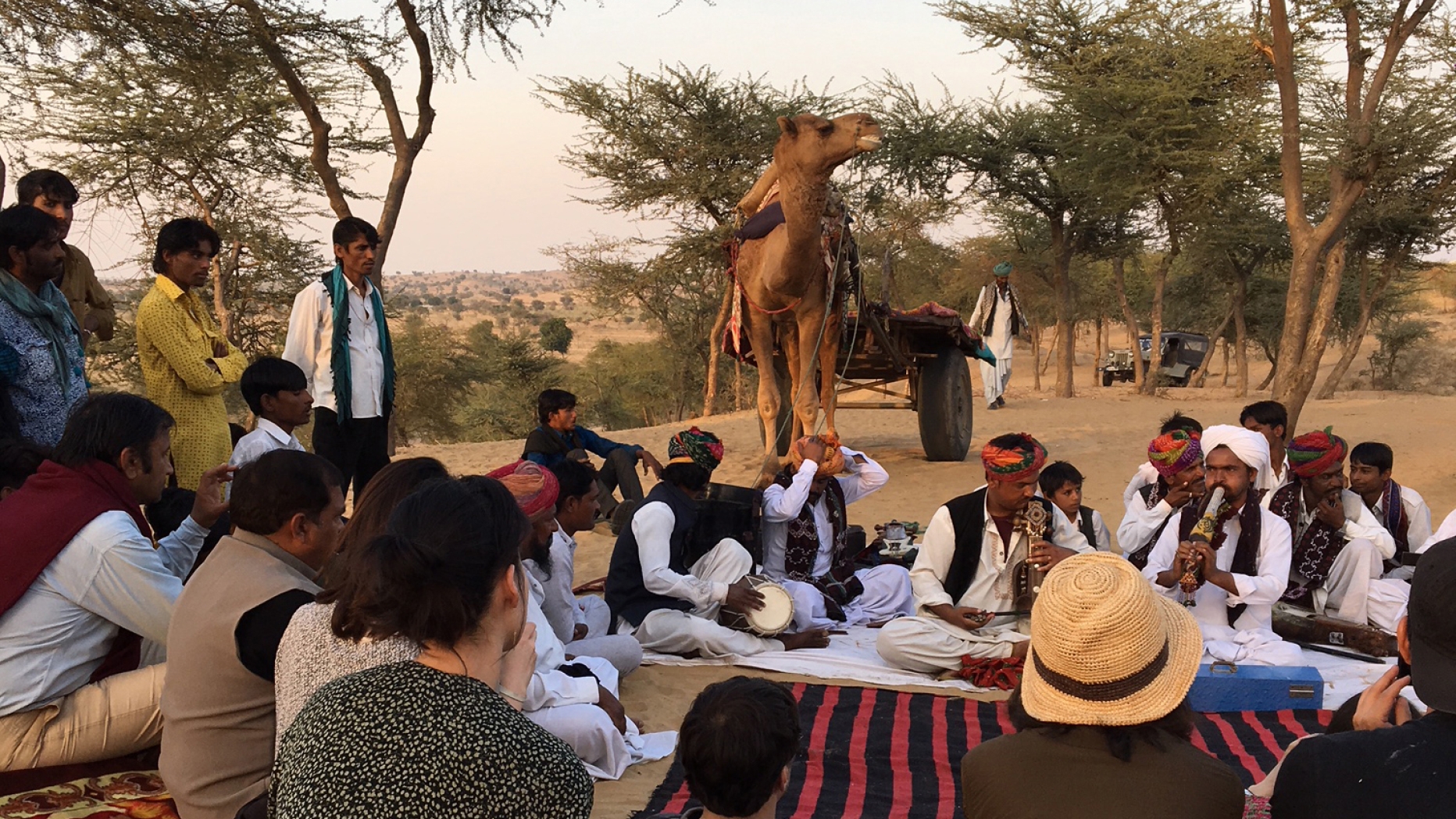 Langa musicians playing music in the dessert