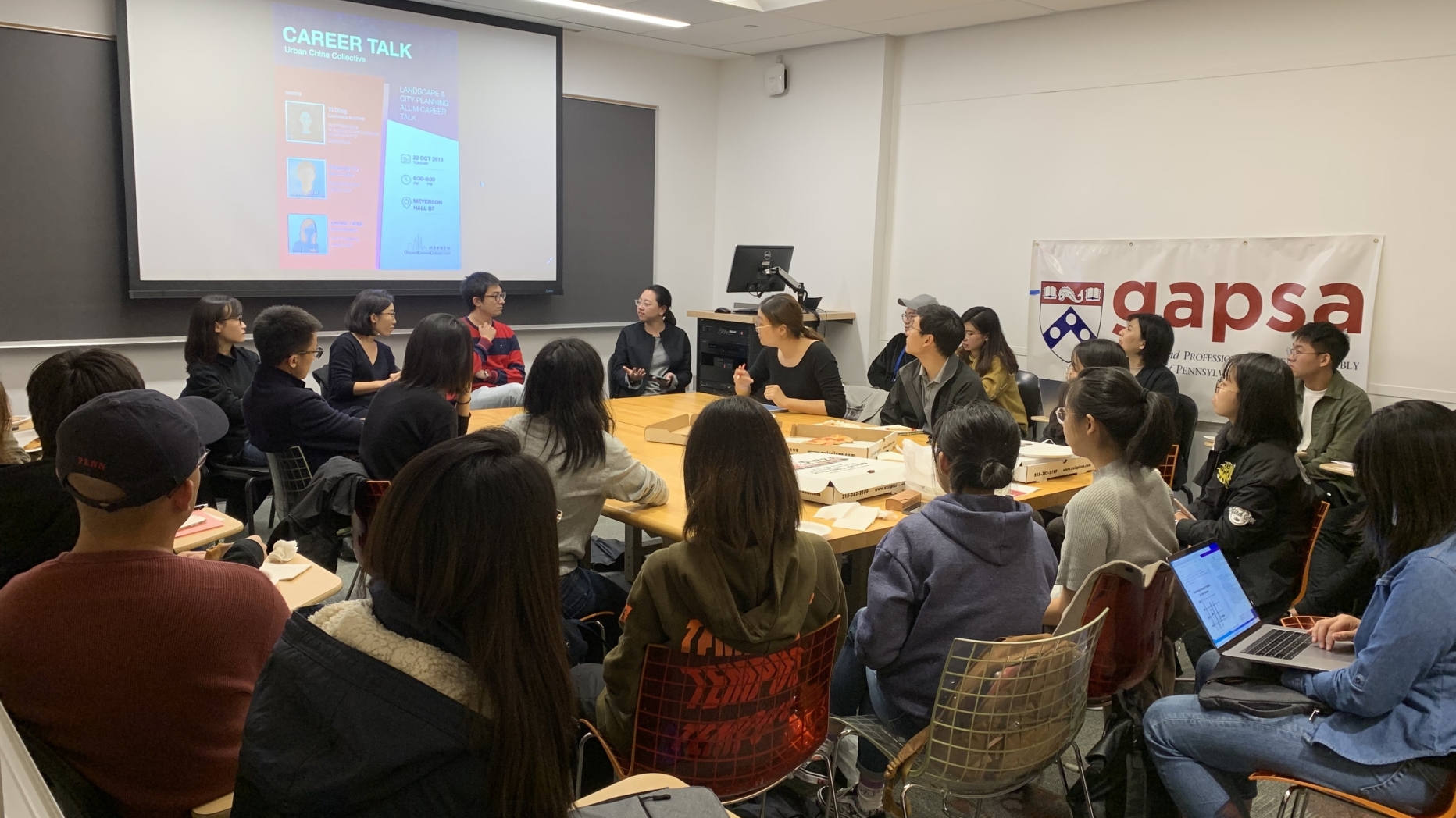 2019 People gathered in classroom attending career talk presentation 1 of 2 photos