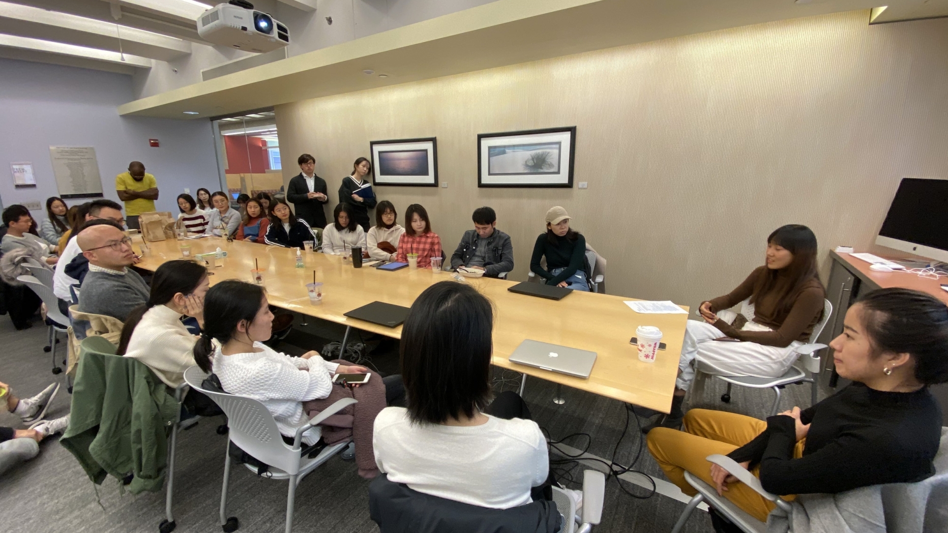 2019 People gathered in classroom attending career talk presentation 2 of 2 photos