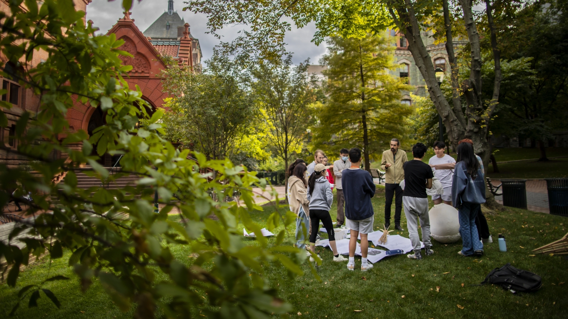 A group of people stand outside