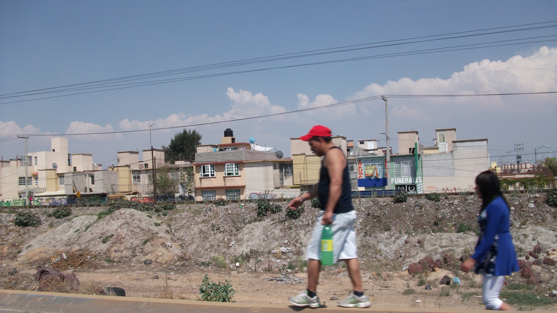 People walking along roadside