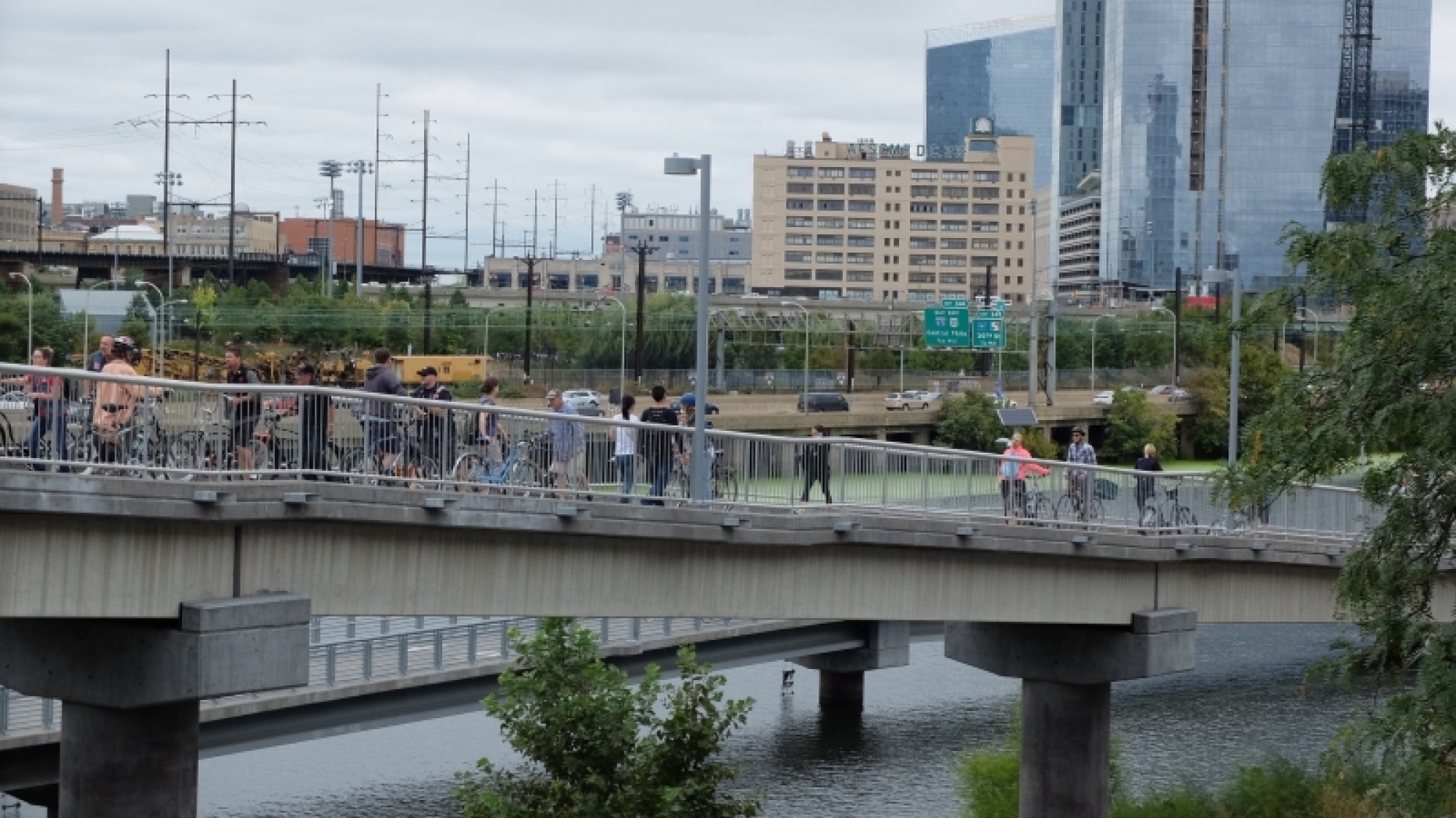 Bridge across the Schuylkill with people walking across it.