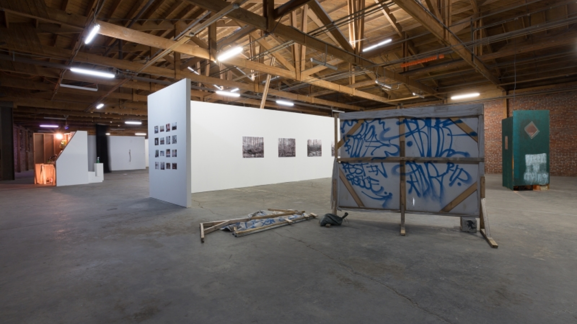 Gallery space with various works on display.