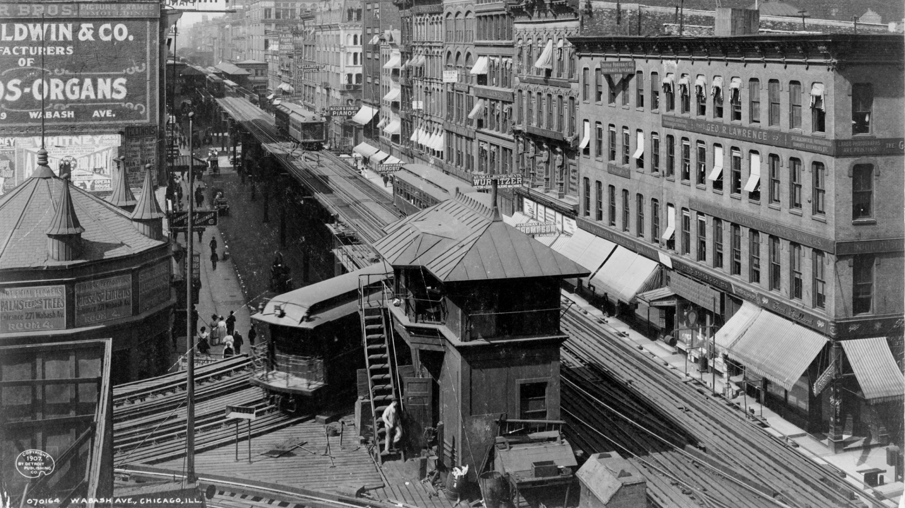 black and white photo of elevated train tracks