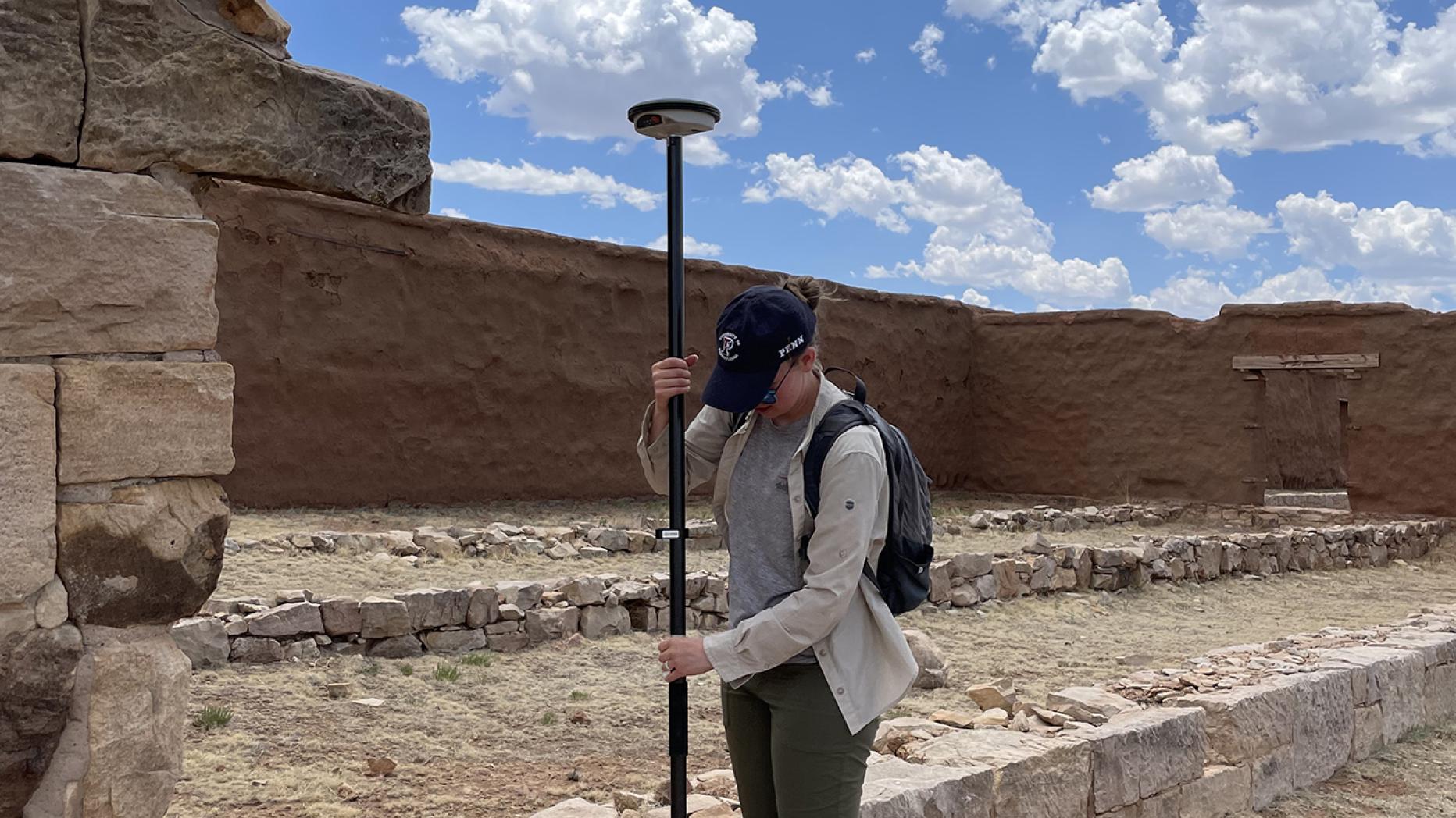 Cameron collecting a GPS coordinate to geo-reference the HABS planof Fort Union