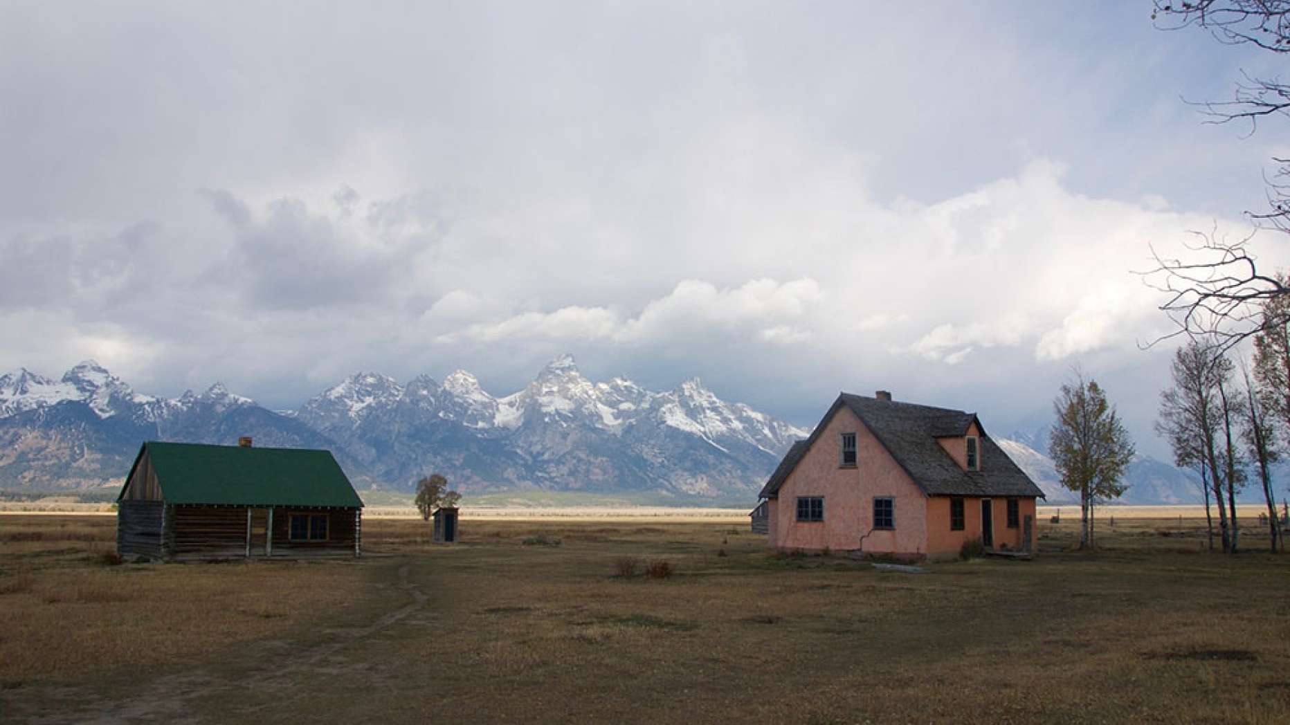 The Moulton homestead with mountains in the background