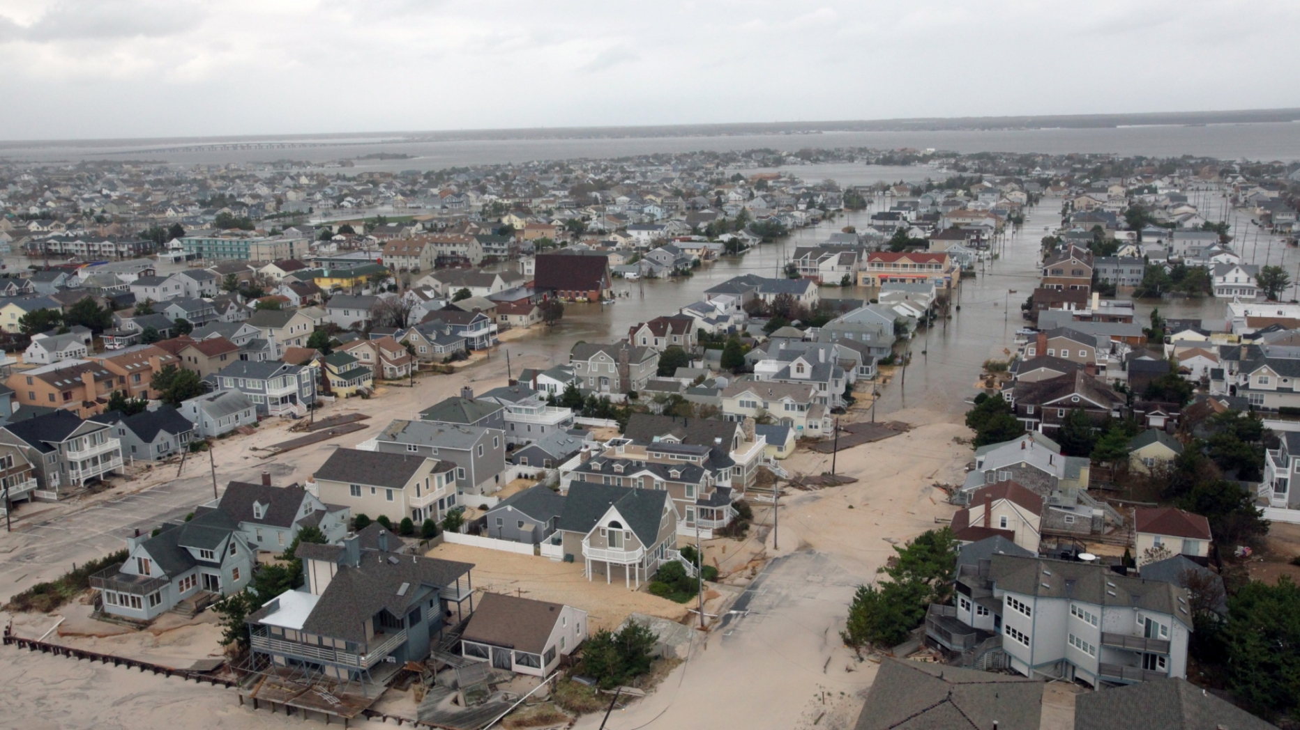 Flooded residential neighborhood. Sand has also come in several hundred meters from the beach