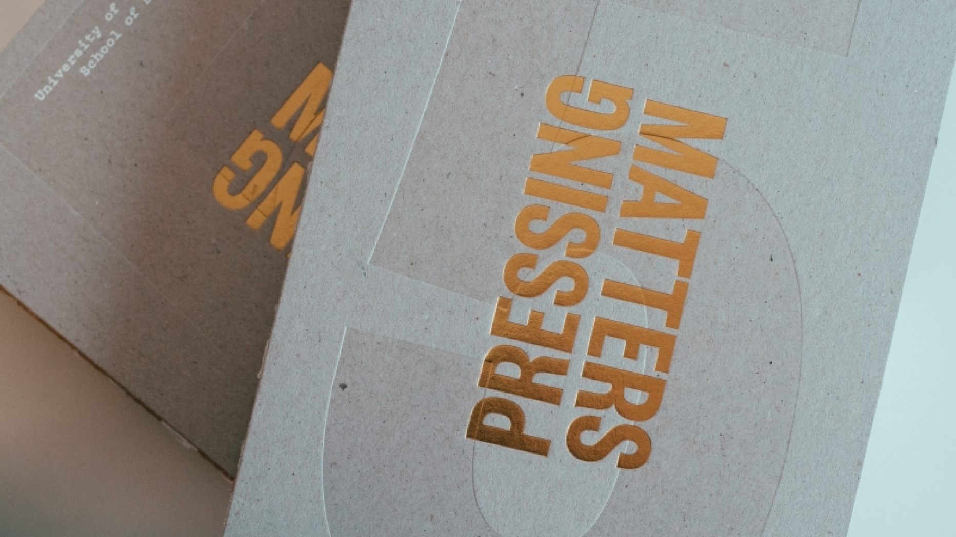 Two copies of pressing matters 5