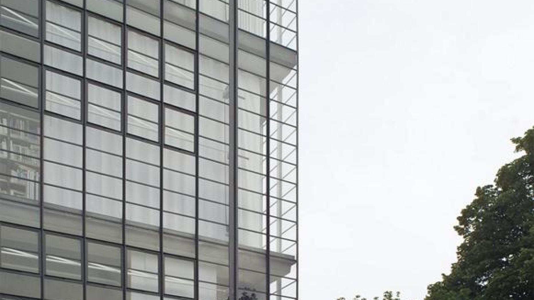 Large modernist building with grids of window panes