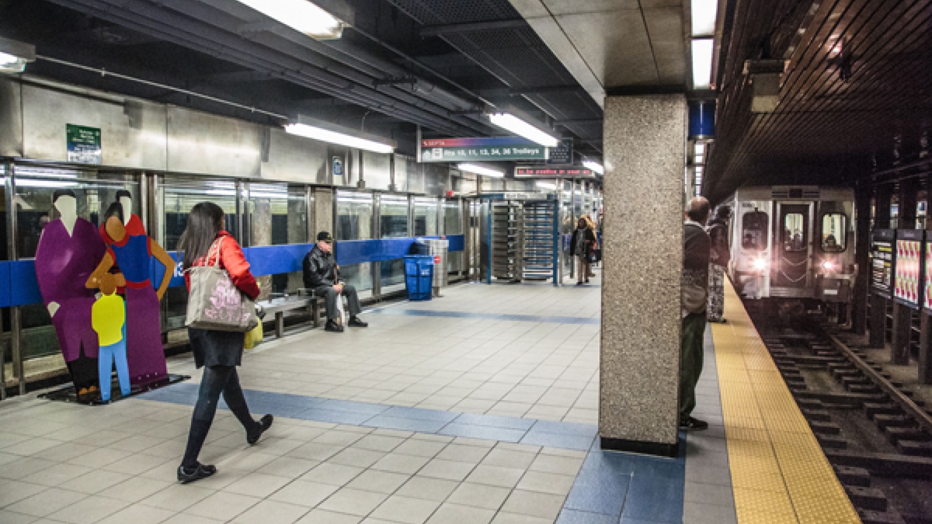 SEPTA subway stop with train arriving