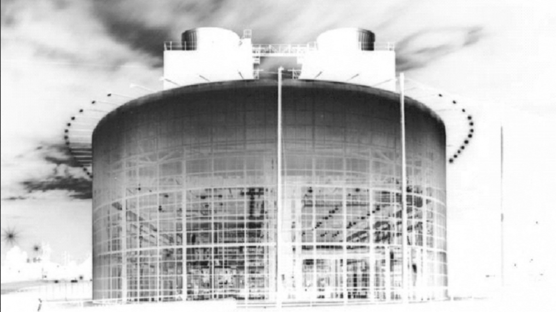 Computer image of large cylindrical building.