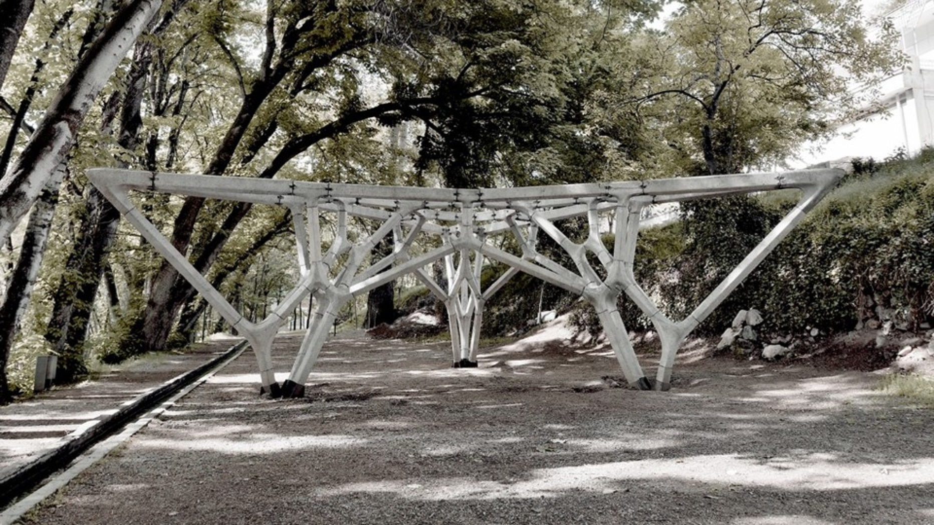 Large frame structure in a park area.