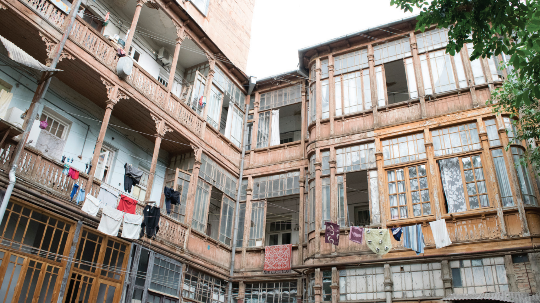 Art Nouveau courtyard with laundry hanging on lines