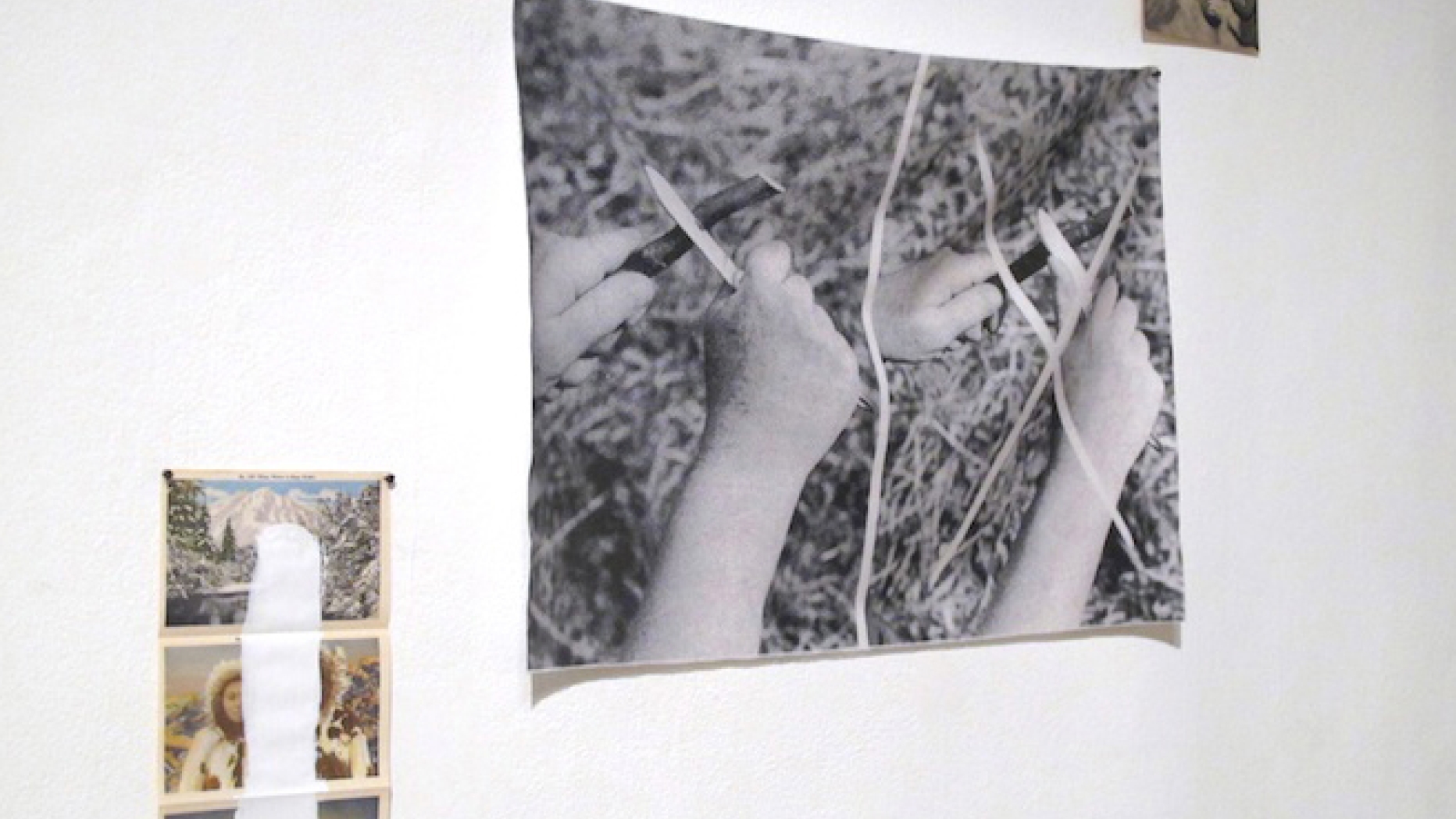 Three photographs on display