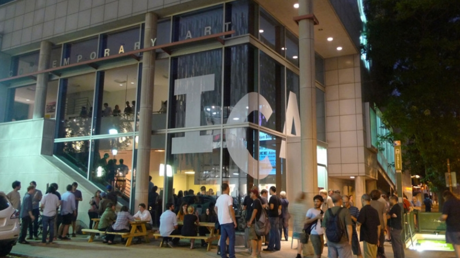 Front of the Institute of contemporary art during the evening with students gathered around.