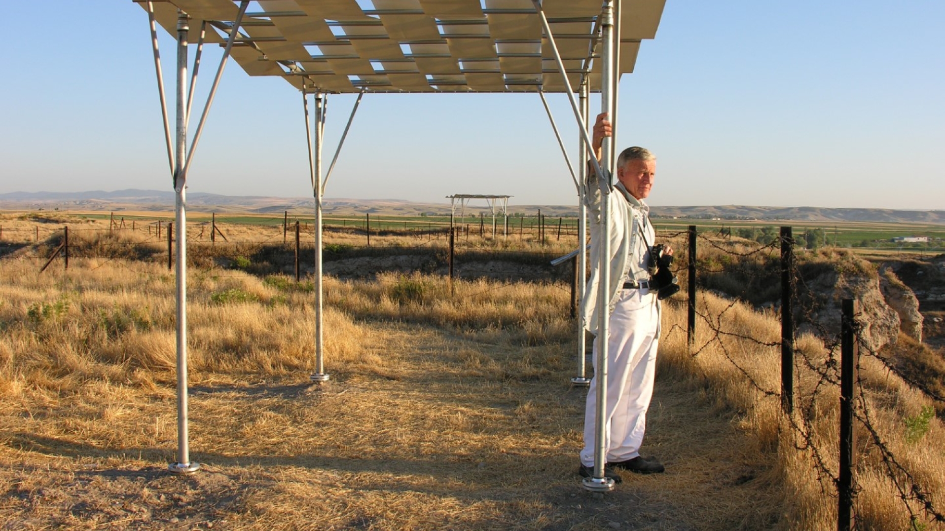 Photo of Lindsay Falck standing under a pavilion 