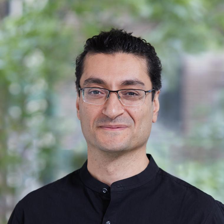 Headshot of Masoud  Akbarzadeh wearing a black shirt