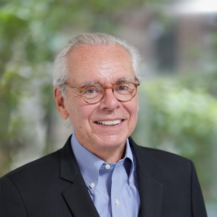 Headshot of Richard Farley wearing a suit jacket and blue shirt