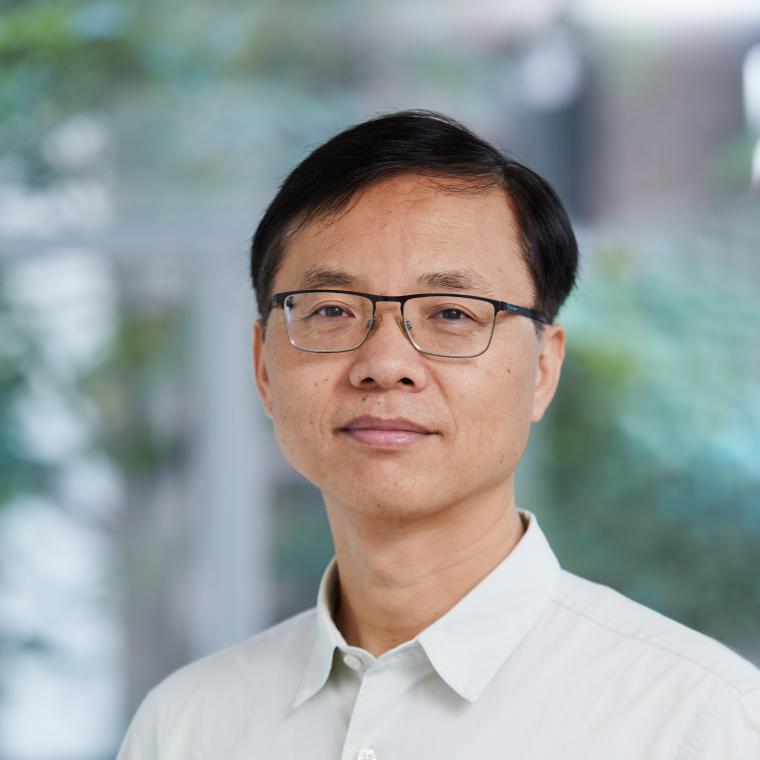 Headshot of Zhongjie Lin wearing a white shirt