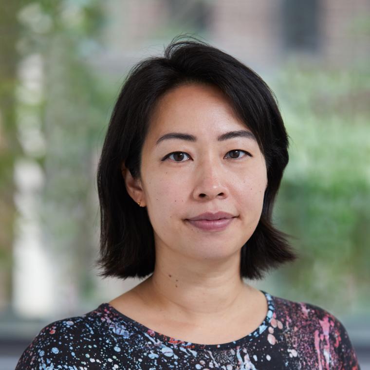 Headshot of Ani Liu wearing a patterned dress