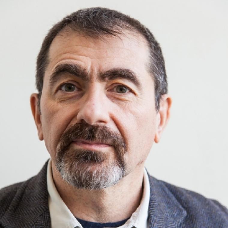 Professor Frank Matero head and shoulders visible, wearing blue suit jacket and white button down shirt