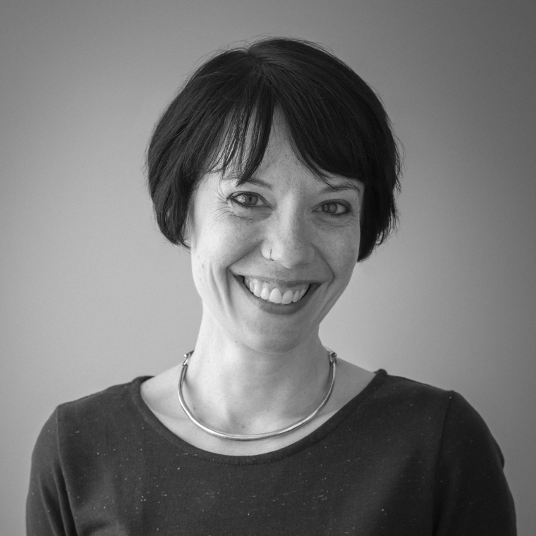 a black and white image of Michelle Delk