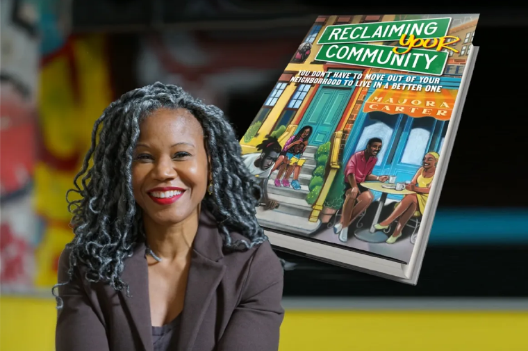 Majora Carte with her book: Reclaiming Communities 