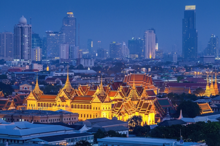 historic architecture in foreground with modern skyscrapers in the background