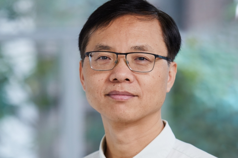 Headshot of Zhongjie Lin wearing a white shirt