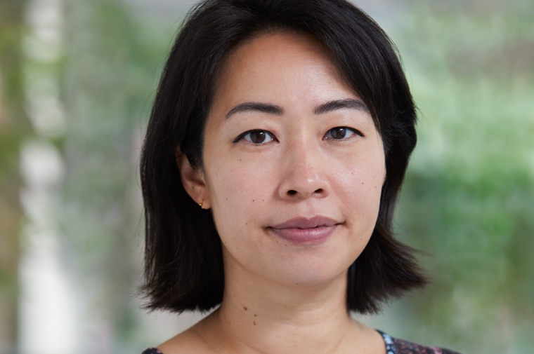 Headshot of Ani Liu wearing a patterned dress