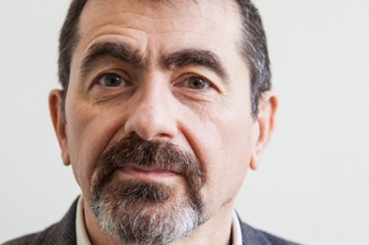 Professor Frank Matero head and shoulders visible, wearing blue suit jacket and white button down shirt